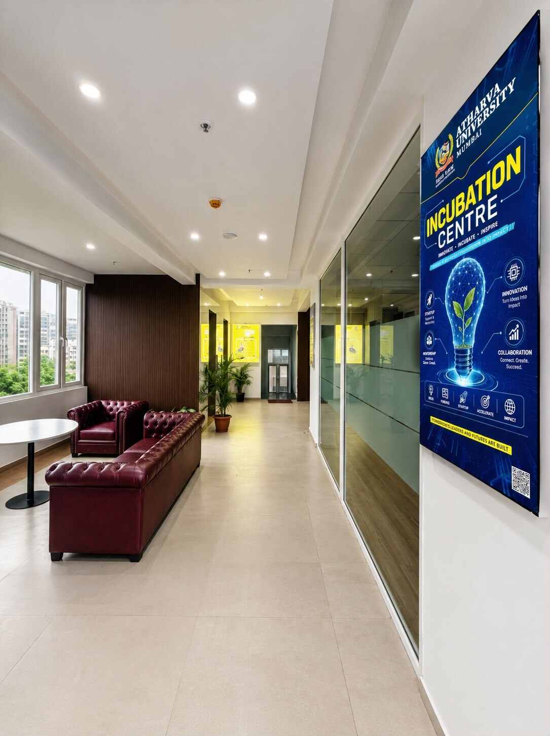 Atharva University International Incubation Centre lounge with 'Incubate, Innovate, Inspire' signage